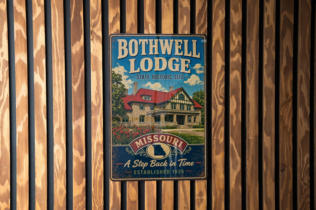 A vintage-style metal sign for the Bothwell Lodge, a historic lodge in Missouri, is displayed on a wooden wall.