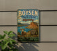 A vintage-style metal sign for Boysen State Park in Wyoming, featuring a scenic landscape with a ram, a lake, and mountains.