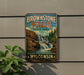 A vintage-style metal sign for Brownstone Falls State Park in Wisconsin, featuring a scenic illustration of the waterfall surrounded by trees and a rocky cliff.