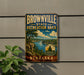 A vintage-style metal sign for the Brownville State Recreation Area in Nebraska, featuring a scenic landscape with a river and mountains.