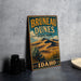 A vintage-style metal sign for Brunette Dunes State Park in Idaho, featuring a desert landscape with mountains and desert vegetation.