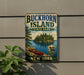 A vintage-style metal sign for Buckhorn Island State Park in New York, featuring a scenic illustration of a lake, trees, and a canoe.