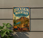 A vintage-style metal sign for Buckkins Mountain State Park in Arizona, featuring a desert landscape with a cactus and mountains in the background.