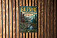 A vintage metal sign for Butano State Park, California, featuring a scenic landscape with a river, mountains, and trees.