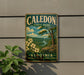 A vintage metal sign for Caledon State Park in Virginia, featuring a scenic landscape with a river, trees, and flowers.