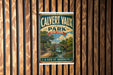A vintage-style metal sign for Calvert Vaux Park in New York, featuring a scenic landscape with a bridge and trees.
