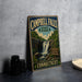 A vintage metal sign for Campbell Falls State Park in Connecticut, featuring a waterfall and forest scenery.