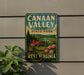 A vintage-style sign for Canaan Valley Resort State Park in West Virginia, featuring a scenic landscape with a cabin and flowers.