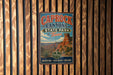 A vintage metal sign for Caprock Canyon State Park in Texas, featuring a scenic illustration of the canyon landscape.