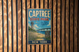 A vintage metal sign for Captree State Park in New York, featuring a scenic illustration of the park and its surroundings.