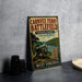 A vintage metal sign for Carnifex Ferry Battlefield, featuring a cannon and a scenic landscape, is displayed on a gray wall next to some black camera lenses.