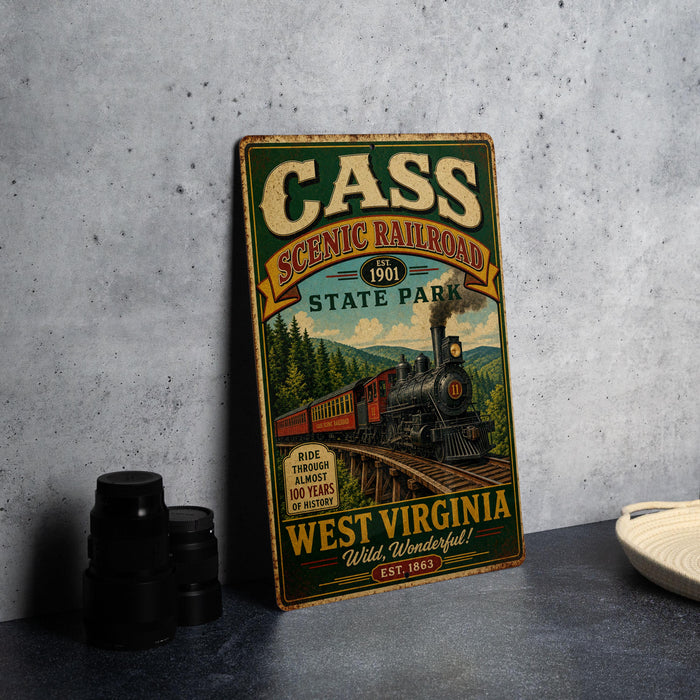 A vintage-style metal sign for Cass Scenic Railroad, featuring a train and the text "CASS SCENIC RAILROAD 1901 STATE PARK WEST VIRGINIA WILD, WONDERFUL!"