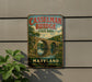 A vintage metal sign for Casselman Bridge State Park in Maryland, featuring a scenic illustration of the bridge over a river.