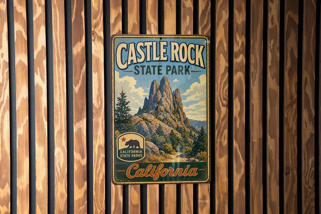 A vintage-style metal sign for Castle Rock State Park in California, featuring a mountain landscape and the text "Castle Rock State Park" prominently displayed.
