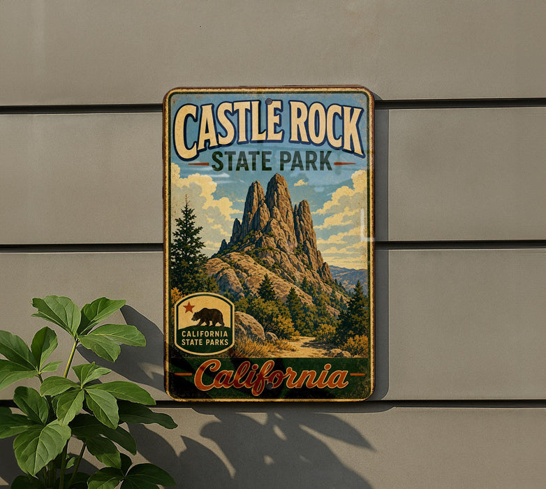 A vintage-style metal sign for Castle Rock State Park, featuring a scenic mountain landscape with a bear silhouette.