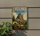 A vintage-style metal sign for Castle Rock State Park, featuring a scenic mountain landscape with a bear silhouette.