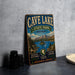 a vintage metal sign for Cave Lake State Park, Nevada, with a scenic landscape of mountains, a lake, and pine trees.