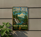 A vintage-style metal sign for Cedar Creek State Park in West Virginia, featuring a scenic image of a waterfall and forest.