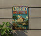 A vintage-style metal sign for the Cedar Key Museum in Florida, featuring a palm tree and a boat on a body of water.