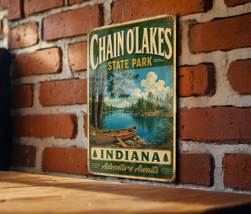 A vintage-style metal sign for Chain O Lakes State Park in Indiana, featuring a scenic landscape with a lake and trees.
