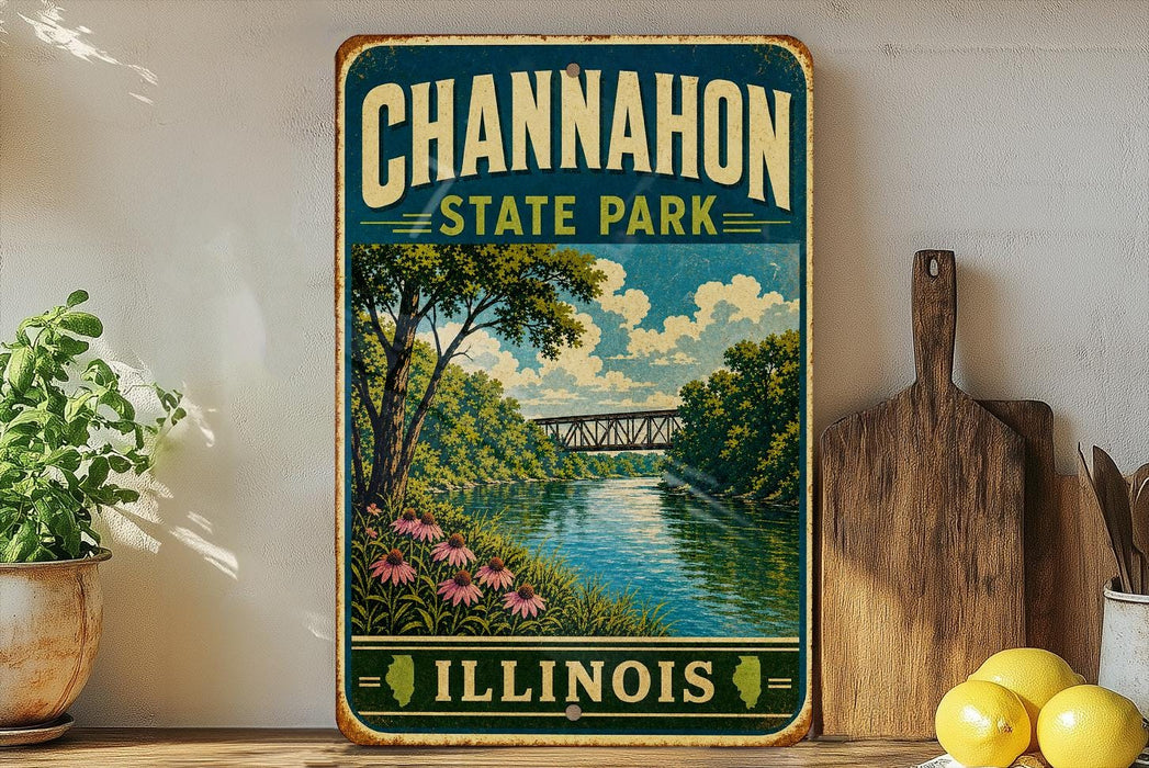 A vintage-style metal sign for Channahon State Park in Illinois, featuring a scenic illustration of a river, bridge, and surrounding landscape.