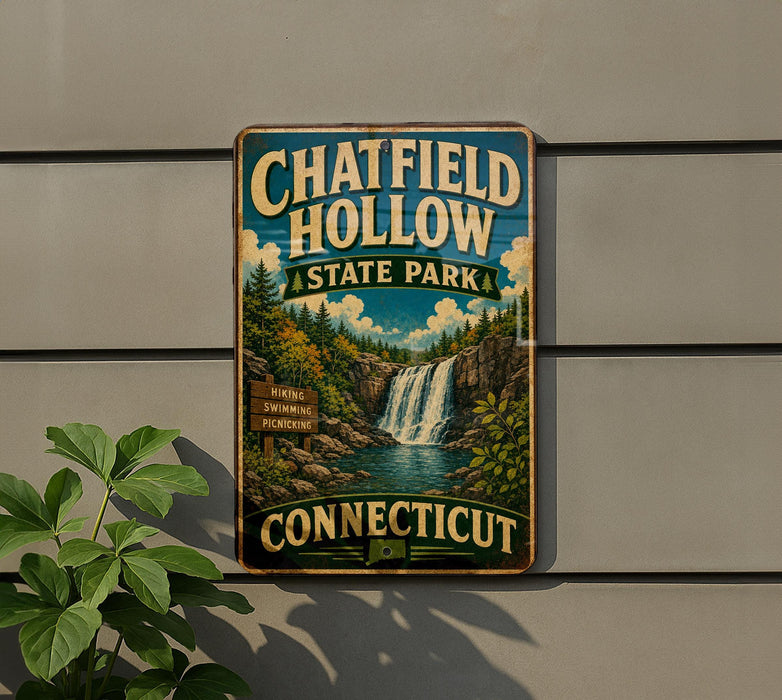 A vintage-style metal sign for Chatfield Hollow State Park in Connecticut, featuring a waterfall and lush greenery.