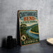 A vintage metal sign for Chattanooga Bend State Park in Georgia, featuring a scenic landscape with a river and trees.