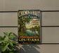 A vintage-style metal sign for Chemin-a-Haut State Park, featuring a lush tropical landscape with a white heron in the foreground.