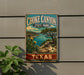 A vintage-style metal sign for Choke Canyon State Park in Texas, featuring a scenic landscape with cacti, mountains, and a lake.
