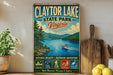 A vintage-style metal sign for Claytor Lake State Park, Virginia, featuring a scenic image of the lake surrounded by mountains and trees.