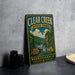 A vintage-style metal sign for Clear Creek State Park in Pennsylvania, featuring a scenic landscape with a river, trees, and mountains.