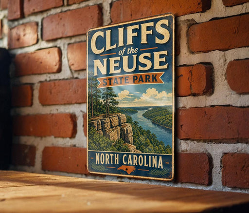 A vintage metal sign for Cliffs of the Neuse State Park in North Carolina, featuring a scenic illustration of the park's cliffs and surrounding landscape.