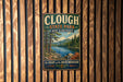 A vintage metal sign for Clough State Park in New Hampshire, featuring a scenic landscape with pine trees, a lake, and mountains.