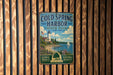 A vintage metal sign for Cold Spring Harbor State Park in New York, featuring a lighthouse and a scenic landscape.