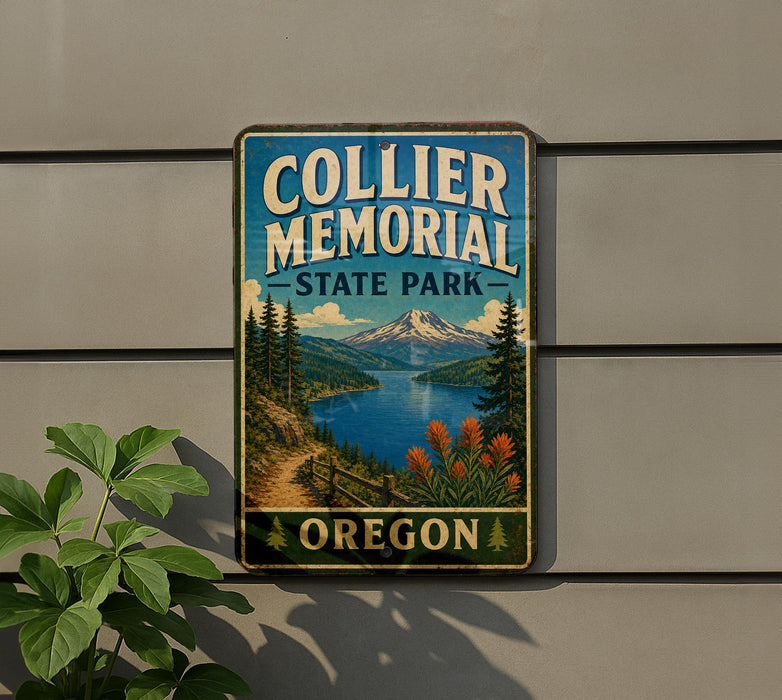 A vintage-style metal sign for Collier Memorial State Park in Oregon, featuring a scenic mountain landscape and a path leading to the park.