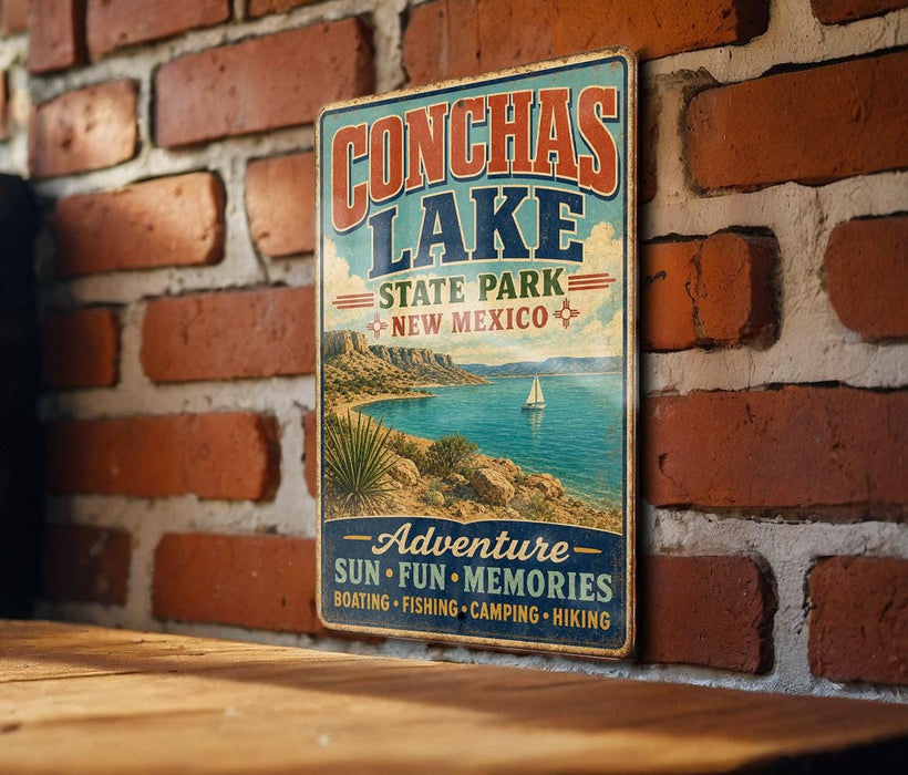 A vintage-style sign for Conchas Lake State Park in New Mexico, featuring a scenic image of the lake and mountains.