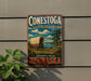 A vintage-style metal sign for Conestoga State Recreation Area in Nebraska, featuring a wagon on a trail and a scenic landscape.