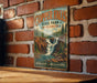 A vintage-style metal sign for Copper Falls State Park in Wisconsin, featuring a scenic illustration of a waterfall surrounded by pine trees.