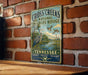 A vintage-style metal sign for the Cross Creek National Wildlife Refuge in Tennessee, featuring a bird illustration and the text "CONSERVE • PROTECT • PRESERVE".
