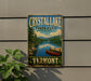 A vintage-style metal sign for Crystal Lake State Park in Vermont, featuring a scenic image of a lake with a red canoe and a forested shoreline.
