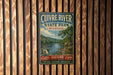 a vintage metal sign for Cuivre River State Park in Missouri, mounted on a wooden wall.