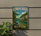 A vintage metal sign for Current River State Park in Missouri, featuring a scenic landscape with a river, cliffs, and trees.