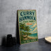 A vintage metal sign for "Curry Hammock State Park, Florida" is displayed on a gray wall, featuring a palm tree and beach scene.