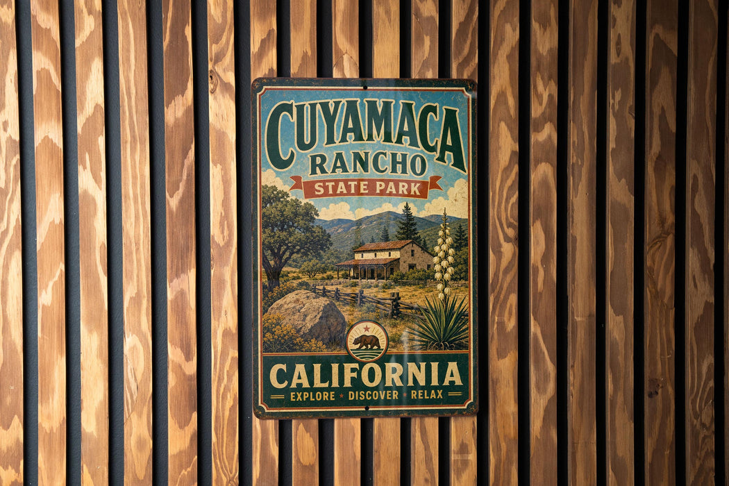 A vintage-style metal sign for Cuymac Ranch State Park in California, featuring a scenic illustration of the park's landscape.