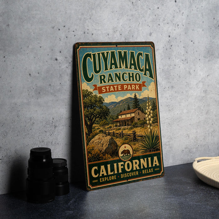 A vintage metal sign for Cuiyama Ranch State Park in California, featuring a scenic illustration of the park and its surroundings.