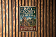 A vintage metal sign for Davy Crockett Birthplace State Park in Lawrenceburg, Tennessee.