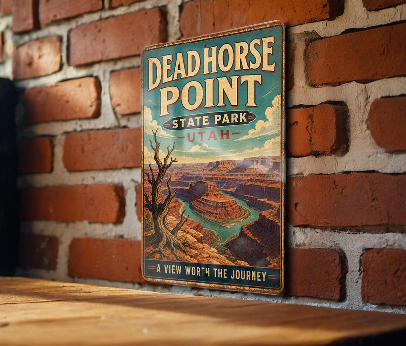 A vintage metal sign for Dead Horse Point, a famous landmark in Utah, is displayed on a brick wall.