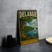 A vintage metal sign for Delabar State Park, featuring a scenic illustration of a lake, trees, and a sailboat, with the text "Delabar State Park" prominently displayed.