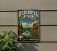 A vintage-style metal sign for Deschutes River State Recreation Area in Oregon, featuring a scenic landscape with a river, mountains, and pine trees.