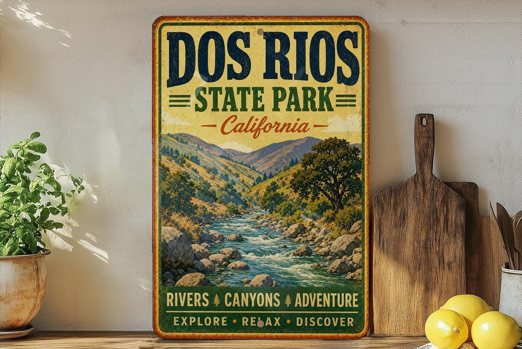 a vintage-style sign for the state park, with a scenic illustration of a river and mountains in the background.
